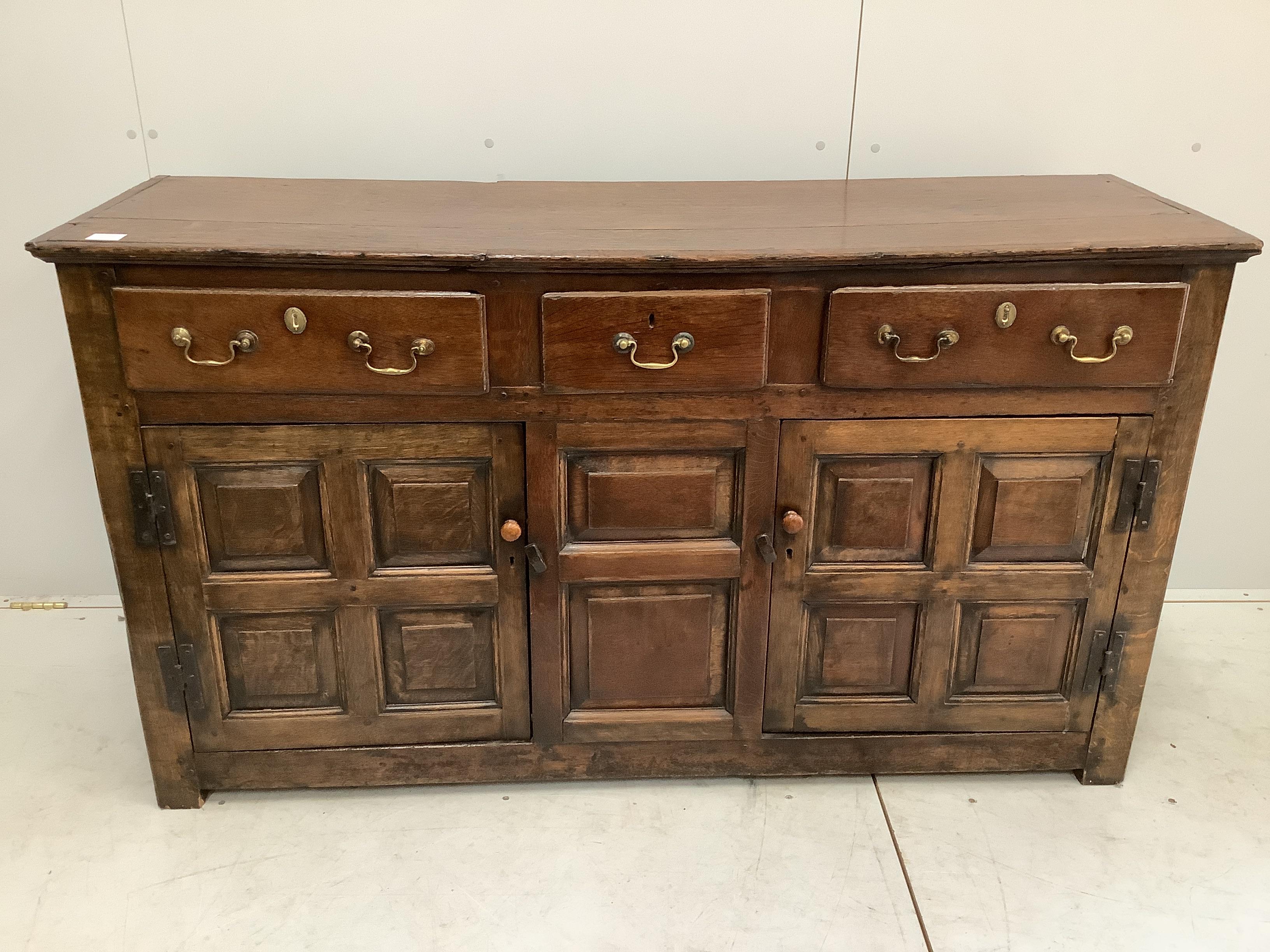 An 18th century oak low dresser, width 155cm, depth 48cm, height 86cm.